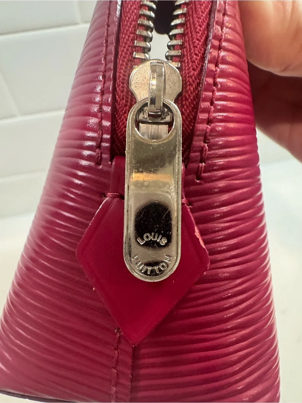Authentic Louis Vuitton Fuchsia Epi leather cosmetic bag